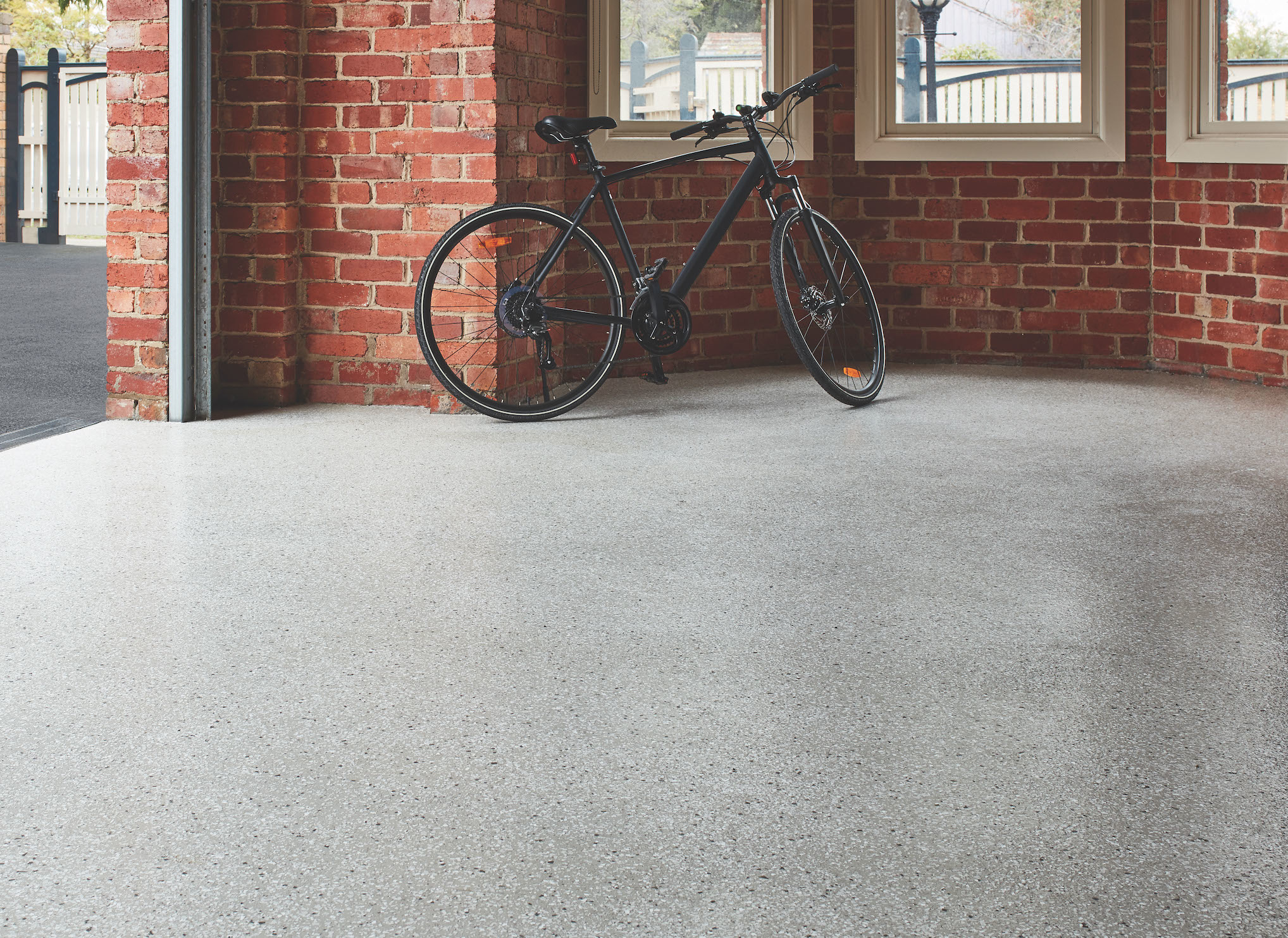 A Stone Monument base with Natural Stone Look Flakes in Grey Clouds.