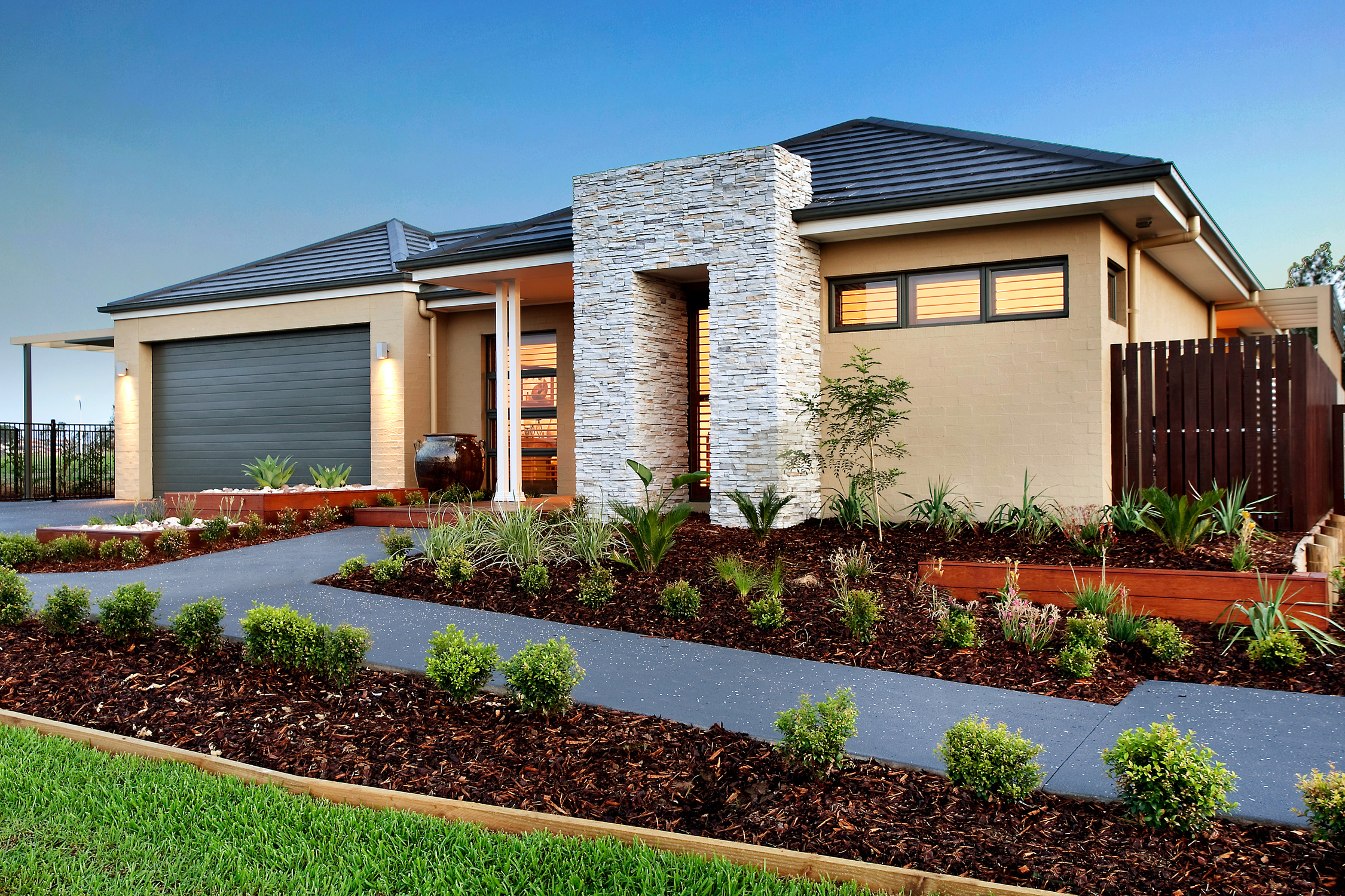 Idea 1: Resurface your old concrete driveway with a modern colour scheme.