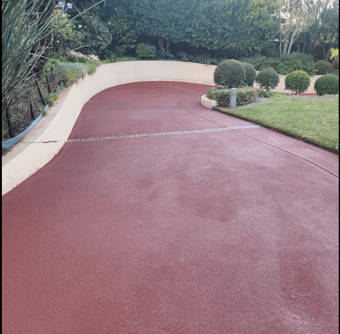 King-crete Solutions in Sydney resurfaced the driveway using Dulux Avista Resurfacing Compound in Brick Red.