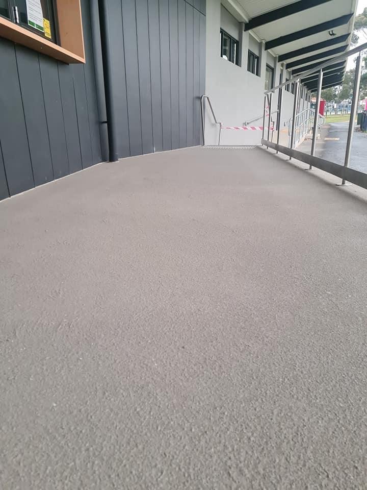 Concrete cracks were repaired on the walkways at St Mary's Football Stadium in Geelong before resurfacing with Dulux Avista. 