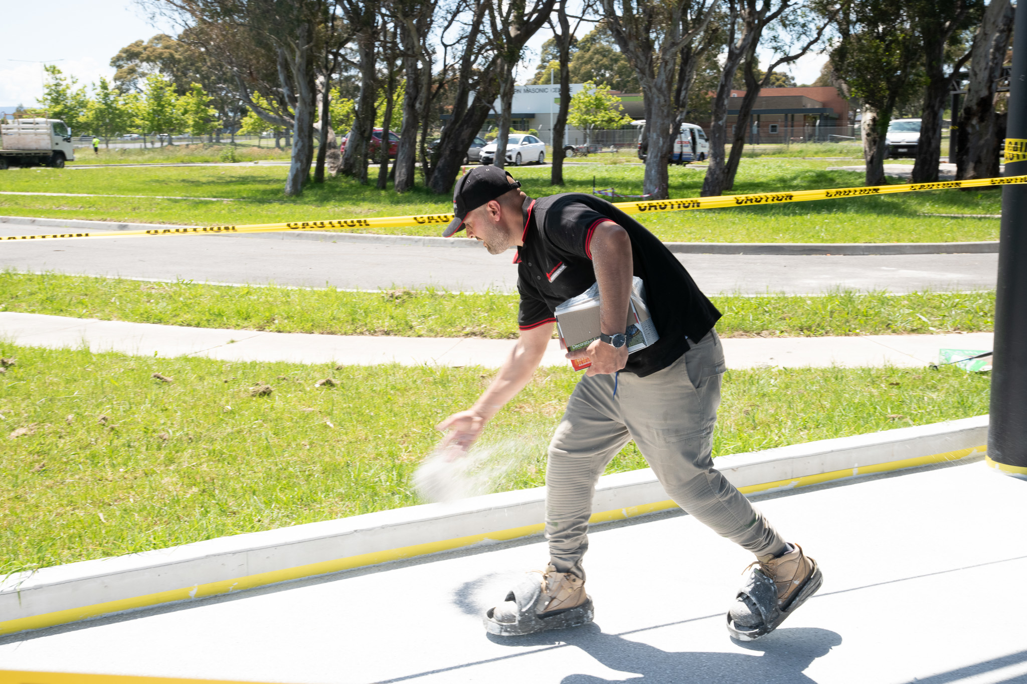 Dulux Avista Accredited Applicators are trained to deliver professional results. This images shows Decorative Flakes being hand cast over an epoxy base coat.