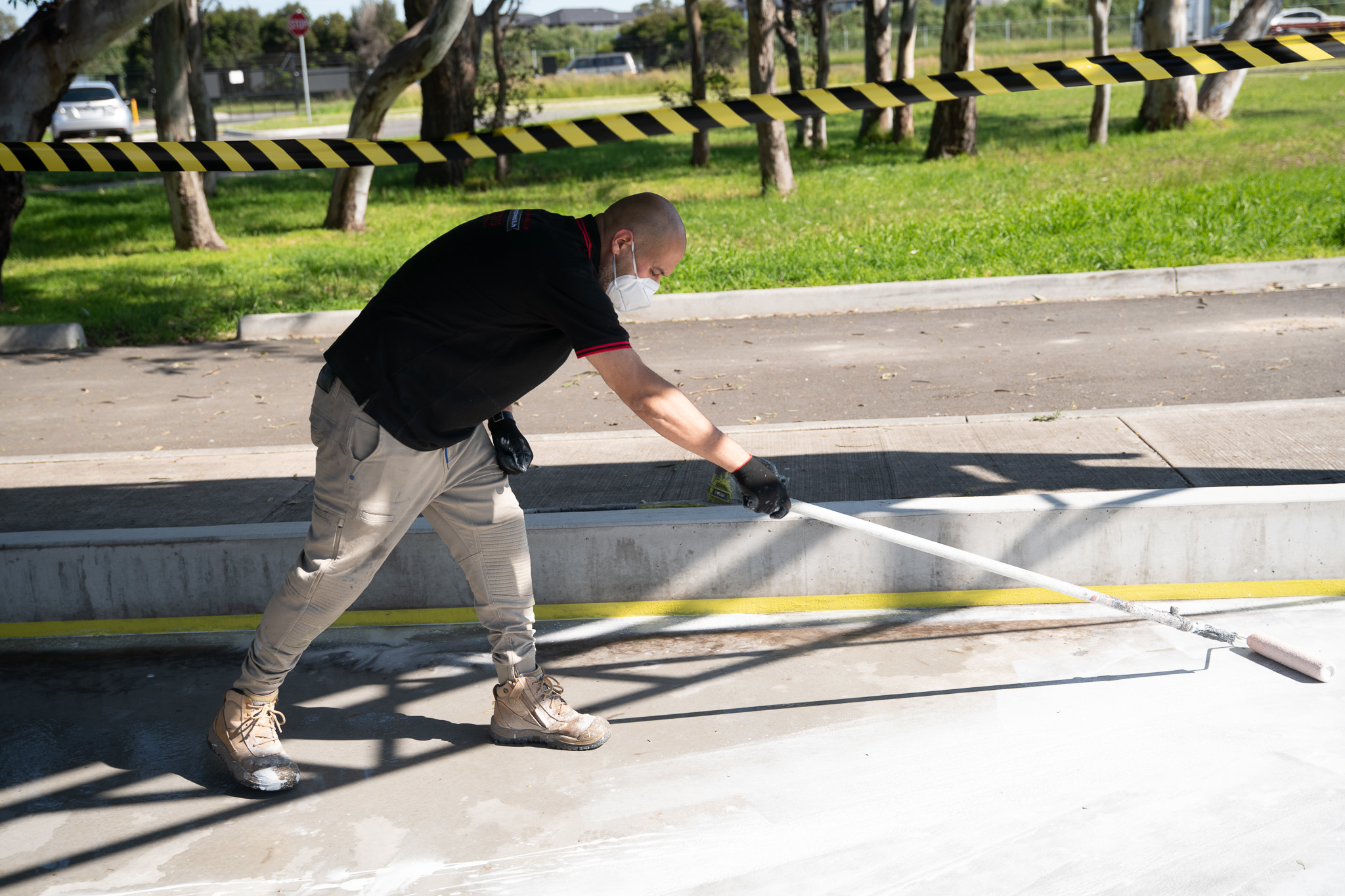 A base coat of Dulux Avista Waterbased Epoxy was rolled on in Chris White.